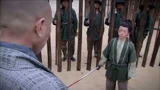 Kung Fu Movie! An 8-year-old boy is thrown into a cage for a duel,but he's actually a kung fu master