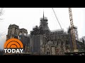 Scaffolding around Notre Dame in Paris begins to come down