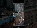 A train running slowly through a building in China