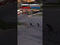 Armed Suspect Charges Police Officer