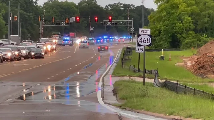 Police escort body of Officer Kennis Croom