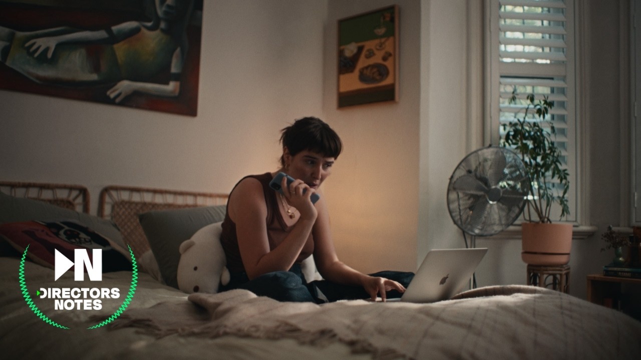 Lead actor Ruby Blinkhorn on the phone in a single-room set