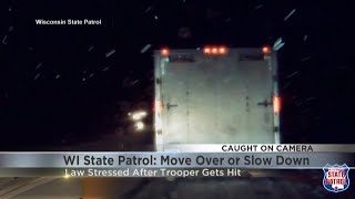 Dashcam video shows car losing control on snowy I-94 before hitting trooper