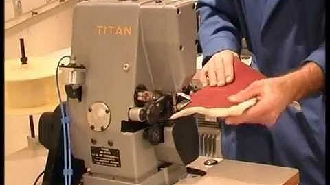 TITAN DK 2700 D-2  BLANKET TAPE BINDING MACHINE  (DE KONINCK BELGIUM)