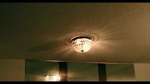 screwing on the TIFFEN GLIMMERGLASS 1 2022 on Fujifilm X-S10