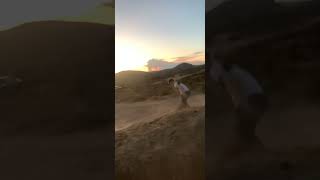 RC Radio control car goes up dirt ramp and crashes into kid