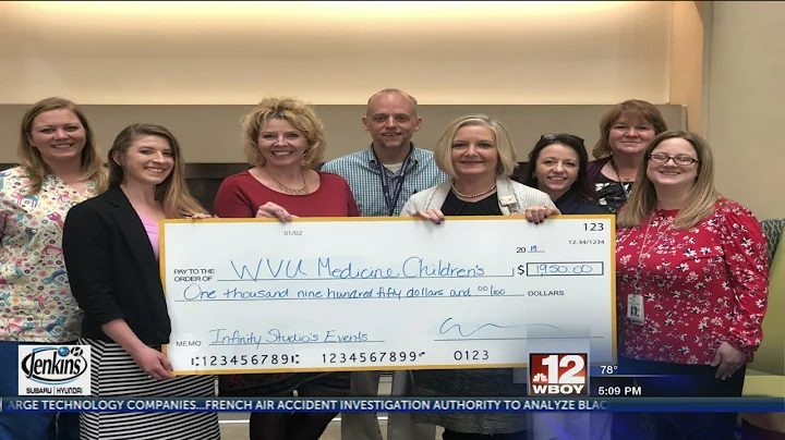 Fundraiser held by Harrison Co. business owner donates check from fundraiser to local hospital