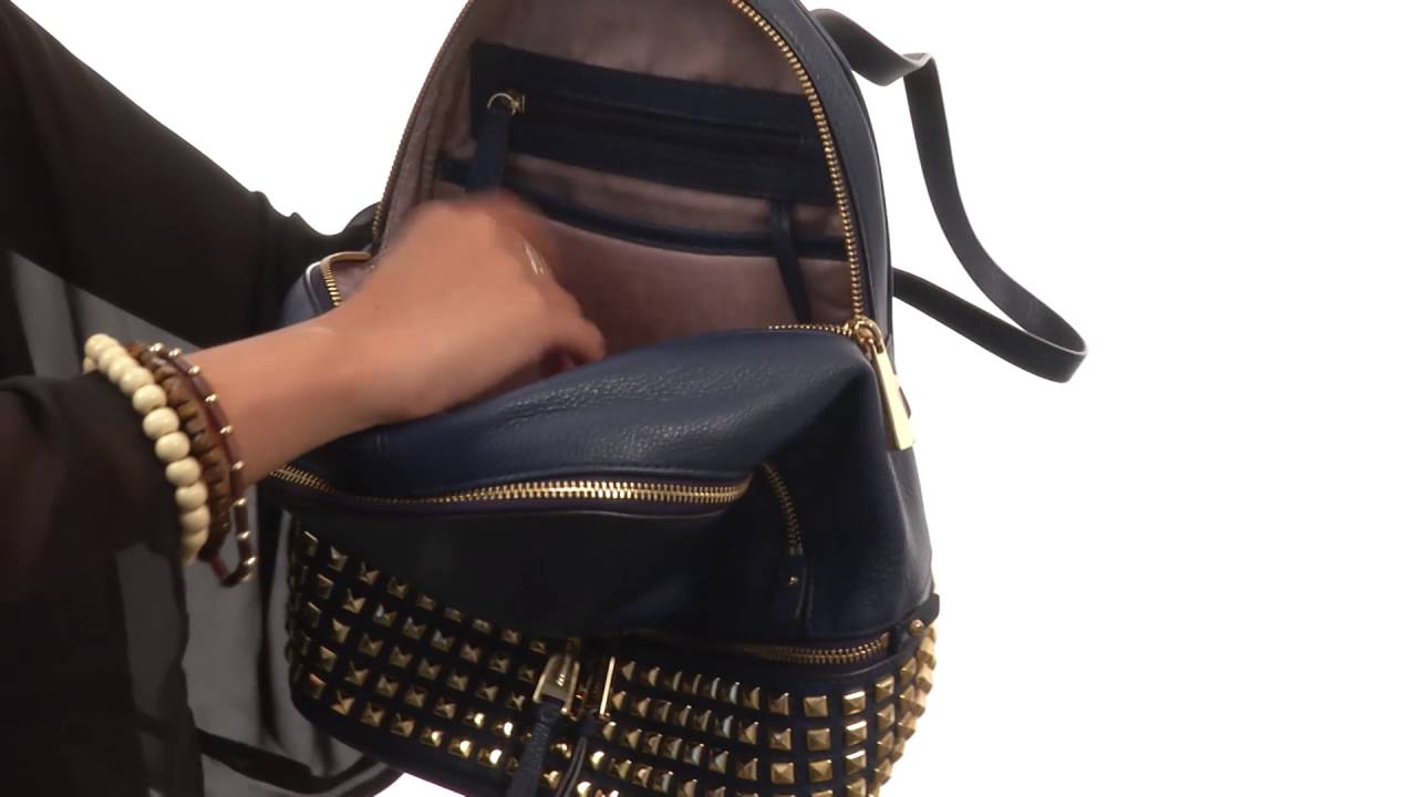 rhea zip studded backpack