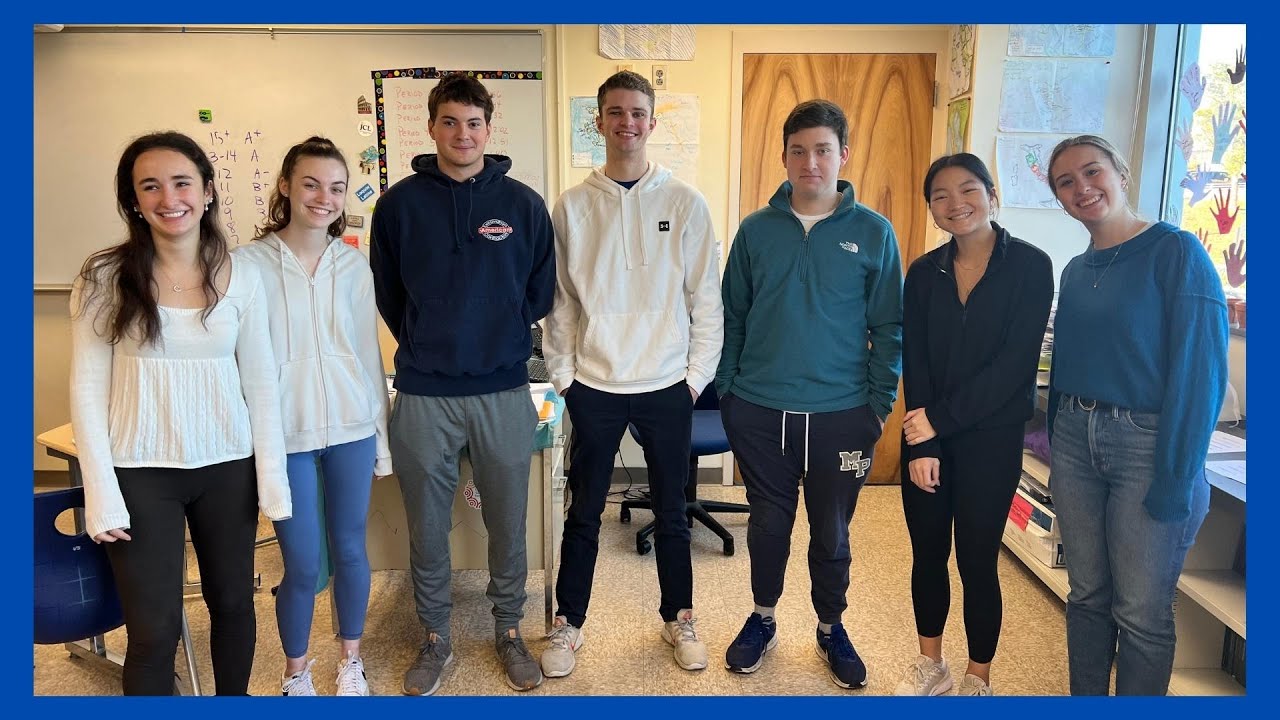 Holy Cross Latin students work with Whitcomb Middle Schoolers! - YouTube