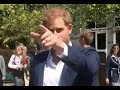 Prince Harry ‘Tells Off’ Member Of Crowd For Giving Meghan Markle Flowers