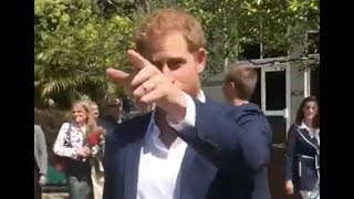 Prince Harry ‘Tells Off’ Member Of Crowd For Giving Meghan Markle Flowers