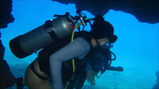 Two Female Scuba Divers Go Diving