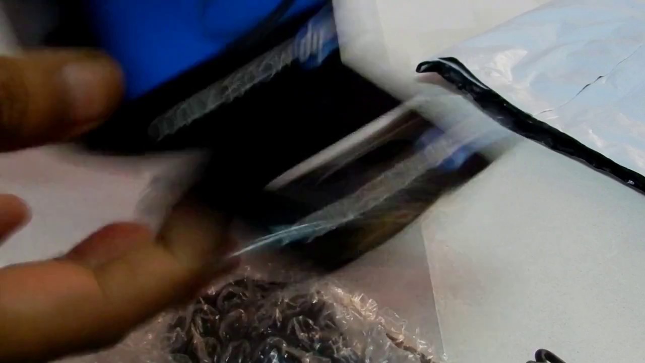 UNBOXING  of  HP  X1000 mouse.