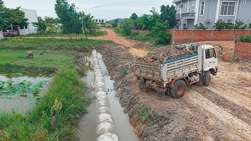 START NEW PROJCET!! Dump Truck & bulldozer work together push soil bury drainage system to LANDFILL