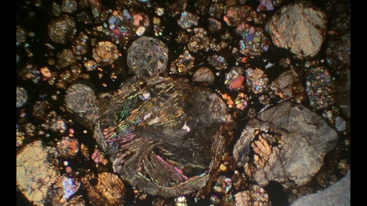 Chondrules in meteorite thin sections in cross-polarized light