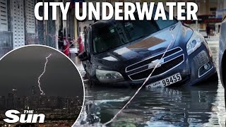 Flooded Dubai paralysed by year of rain in 24hrs as city denies cloudseeding to control weather