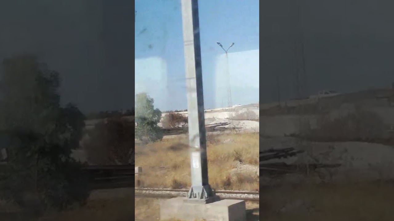 Long-distance train journey on the southern suburbs of Tunis from Tunis to Jebel Jloud