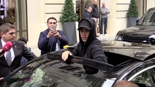 Justin Bieber coming out of his hotel in Paris