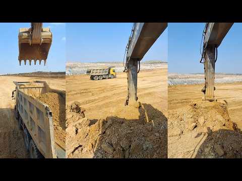 Excavator and Dump Truck Loading in the Mine 