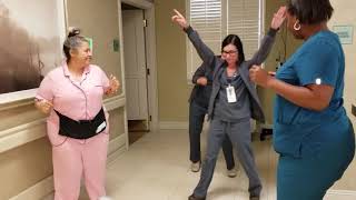 Woman dances after Double Mastectomy with staff  at St Charles New Orleans