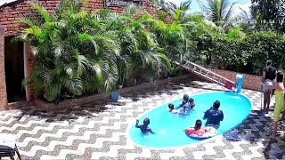 Man Falls From Ladder While Adjusting Security Camera