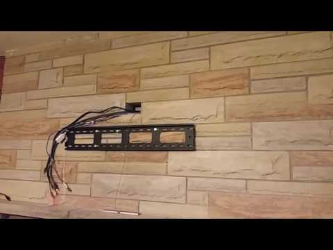 wall-mount-a-tv-over-fireplace--with-no-visible-wires-showing