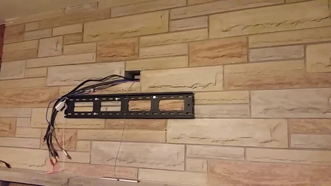 tv wall mount above fireplace