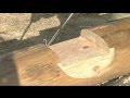 Cutting square notch log cabin