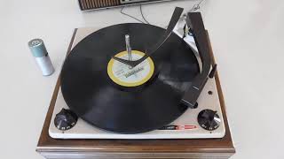 Heathkit Daystrom 4 speed automatic record changer playing a couple LP's.