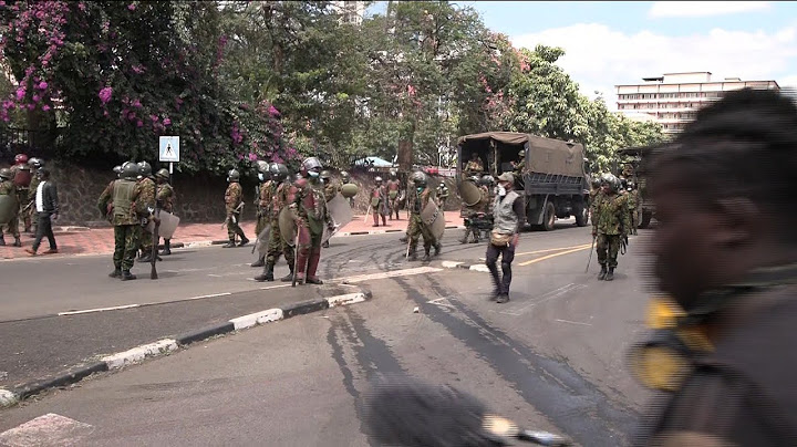 Kenya police, anti-tax protestors clash near parliament debating tax hike bill | AFP