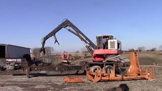 1993 Prentice 210D Loader with a CTR Delimber and CTR Buck Saw