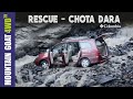 Toyota Innova gets ROYALLY stuck while crossing a mountain stream: Mahindra Bolero rescues it [Video]