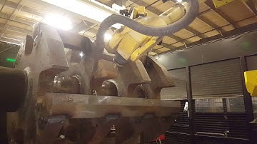 Fanuc M710iC 20L dual arm robot performing touch sensing