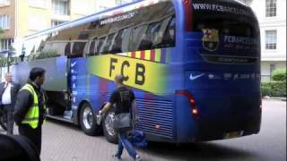 Fc barcelona team leave hotel and board coach for airport with
champions league cup. **no press or media were allowed in this area,
exclusive footage**