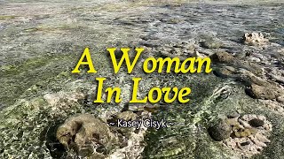 A WOMAN IN LOVE - (Karaoke Version) - in the style of Kasey Cisyk