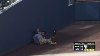 Gomes slides into the wall for terrific grab