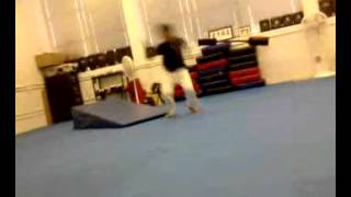 Carlos roundoff backflip 180 twist