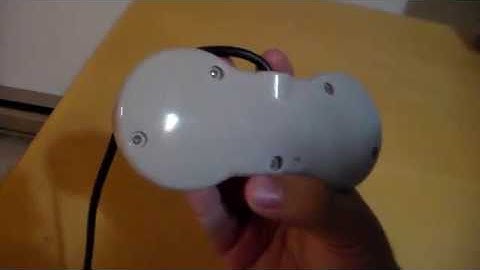 Taking apart a Nintendo NES dogbone controller