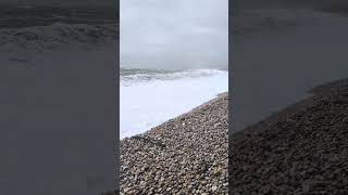 Wet and Wild.Chesil beach on Portland in Dorset.
