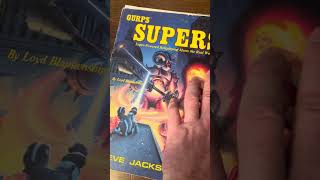 Unboxing random old TTRPGs gurps D&D savage worlds.
