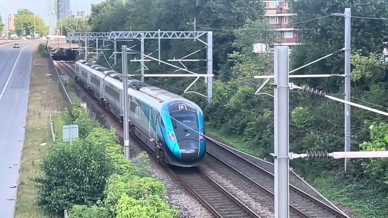 Transpennine express class 802 passing by bridge on manchester highway/motorway at 29.07.24
