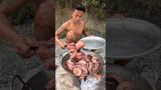 Eating Boiled Octopus 