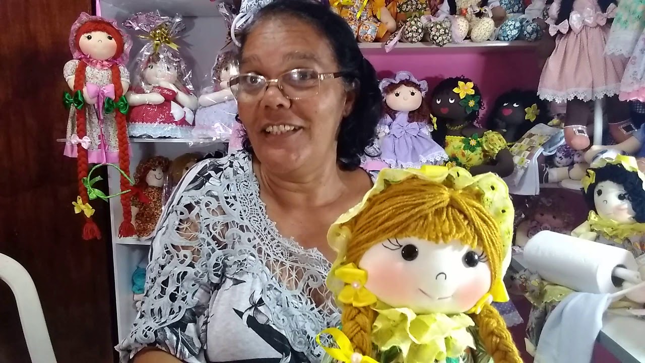 Boneca porta papel toalha +3ultilidades.