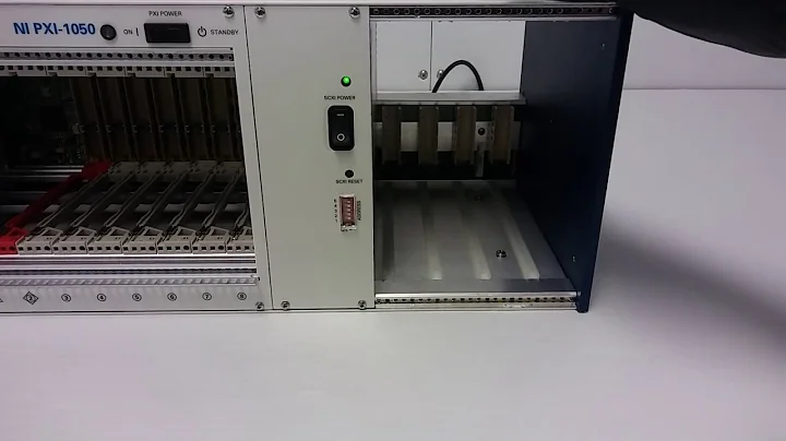 National Instruments NI PXI-1050 Chassis 779199 8-slot w/ 4-slot SCXI - 11692