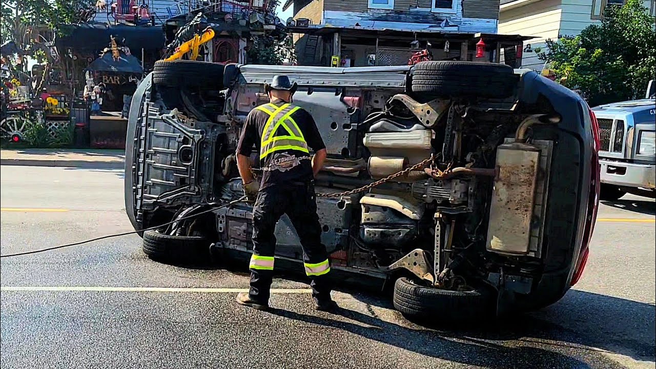 Car flips on side after collision with truck - YouTube