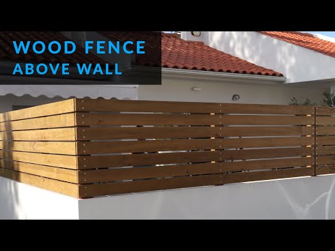 How To Install A Wood Fence Above A Wall - Youtube