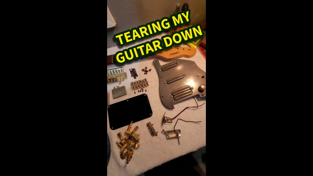 Taking my Peavey guitar apart for service. 