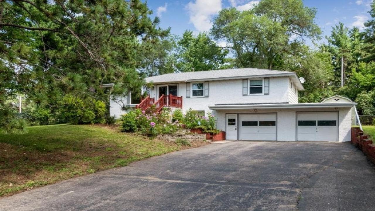 813 W River Road, Champlin, MN Presented by Christy Fellerman.