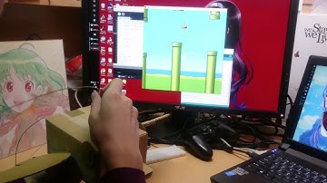 A Flappy Bird-liked Game with Self-made Controller