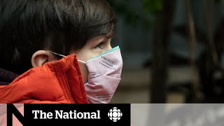 Vaccinated adults help keep unvaccinated kids safe, experts say